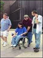 Richard Castaldo in Bowling for Columbine, along with Michael Moore, Mark Taylor, and Brooks Brown