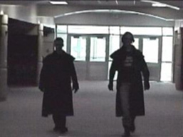 Eric Harris and Dylan Klebold in the halls of Columbine High School in the video Hitmen for Hire