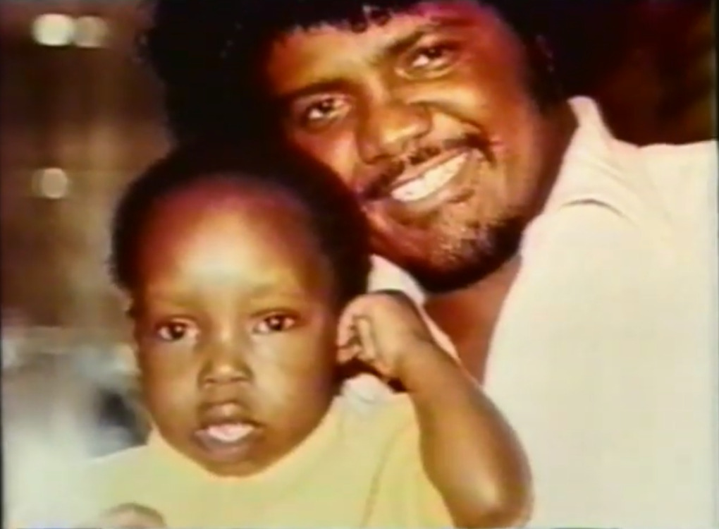 Young Isaiah Shoels with dad