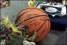 Basketball signed by the whole team and left at Dave Sanders' memorial