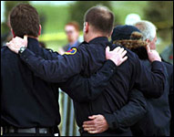 Officers console each other