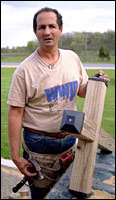 Greg Zanis with one of the Columbine crosses