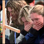 Girls cry at the Columbine memorials in Clement Park